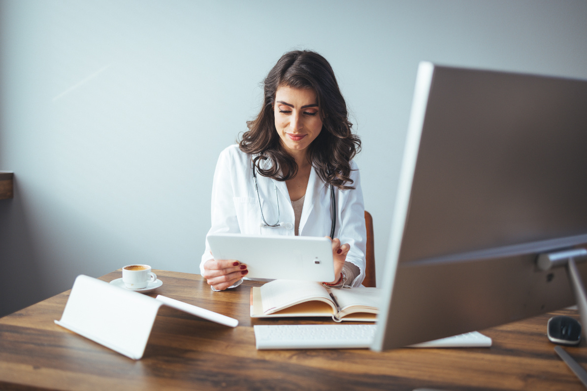 A clinician coordinating care across multiple care models